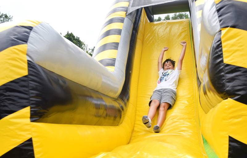 Kids enjoy all the games and activities available in the Fun Zone of Newton Fest on Saturday, June 10 at Maytag Park.