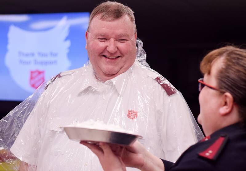 As a result of Rotary raising more funds for the Salvation Army than Kiwanis, Captain  Tim North voluntarily took a pie to the face during a volunteer recognition dinner April 19 at the organization's Newton headquarters.