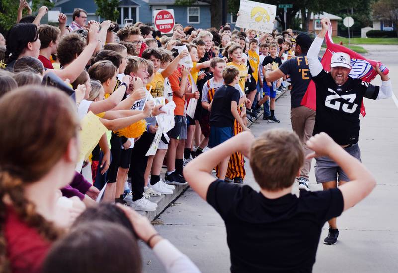 Teachers and students at Berg Middle School hype each other up on Sept. 4 while dressed in Hawkeye and Cyclone gear in preparation for RVTV coming to town.