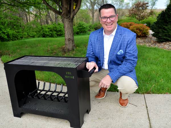Newton man creates outdoor fireplace grill, which is now an entrant in Coolest Thing Made in Iowa contest