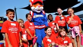 YMCA campers enjoy health and wellness activities in a NASCAR setting