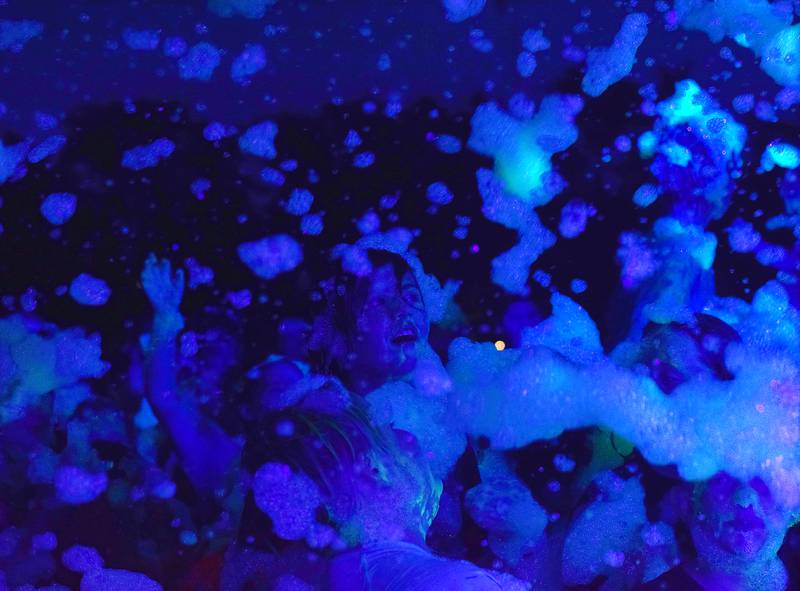 Kids enjoy the return of the Glow Foam Party – which featured two cannons this year – during Newton Fest on June 7 at Maytag Park.