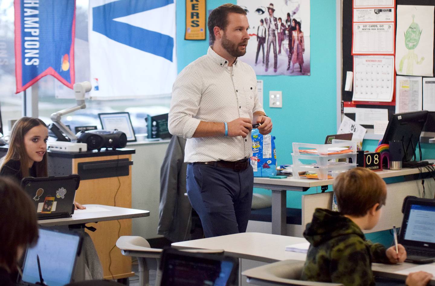 Tyler Stewart, a Democratic candidate running for Iowa Senate District 19, finishes teaching a class at Berg Middle School on Nov. 8 in Newton.