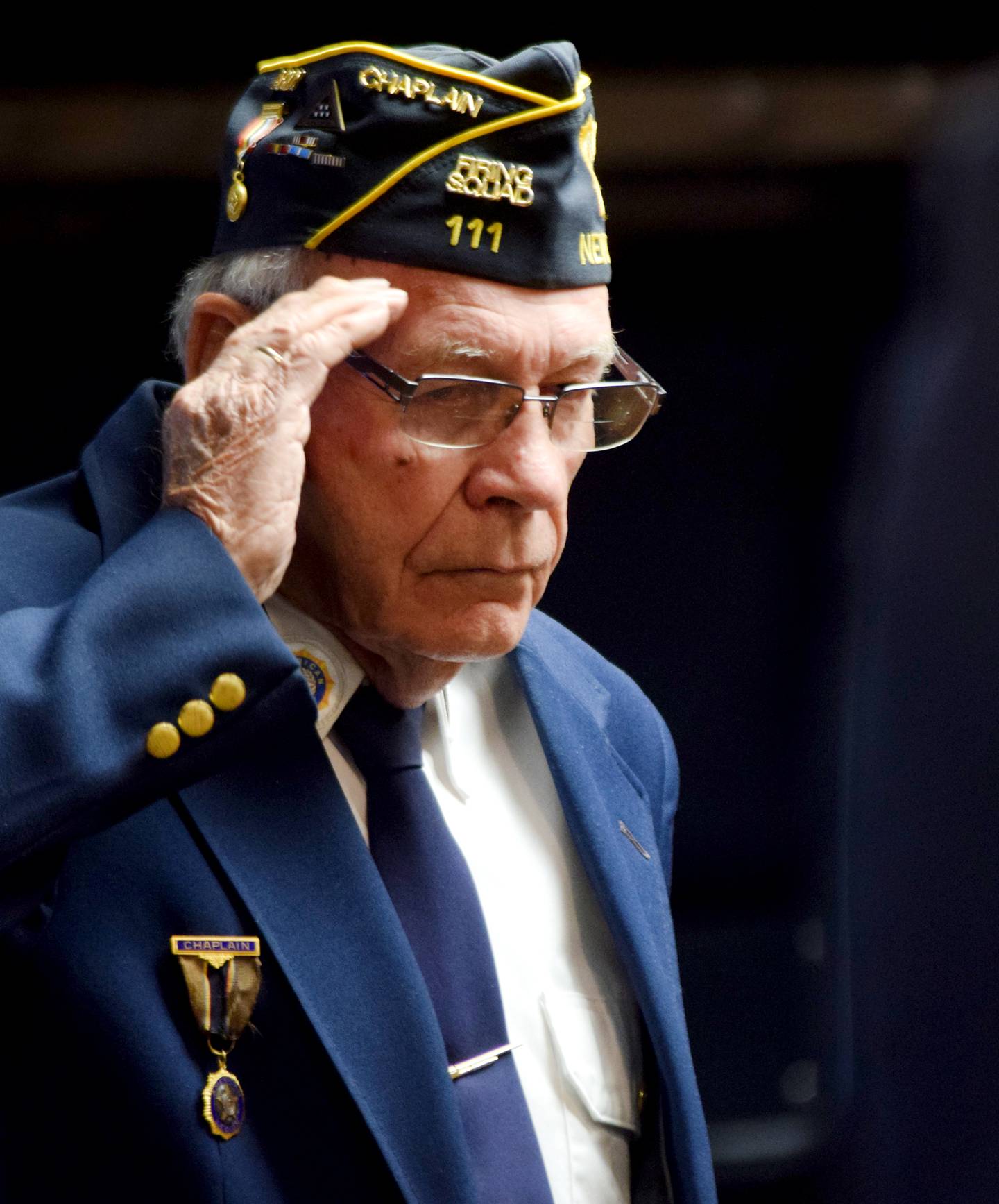 Marvin Morris, the chaplain of American Legion Post 111 and a Korean War veteran, salutes during a Veterans Day ceremony on Nov. 11 in Newton.