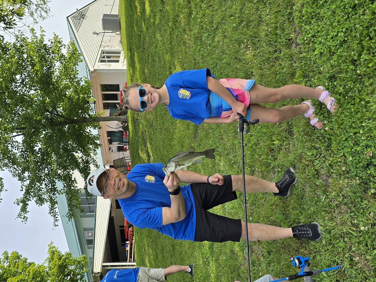 Officer Kyle Lovan of the Newton Police Department participates with local students during the Cops and Bobbers event May 31 at the Izaak Walton League pond.