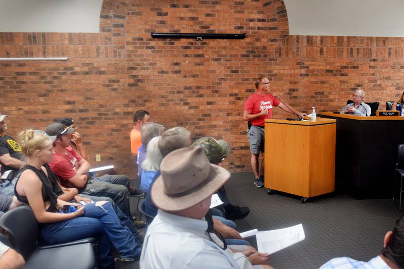 Scott Farver, of Farver True Value, speaks to city council members during their meeting on June 19 at Newton City Hall. Farver and another business owner complained they did not receive any notification from the city that their businesses would effectively be closed due to the street closures from RAGBRAI on July 27.