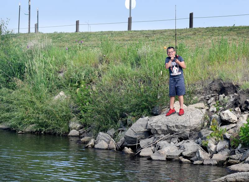 Young anglers catch bluegills and bass (and sometimes softshell turtles) during the Youth Fishing Derby on June 3 at Quarry Springs in Colfax.