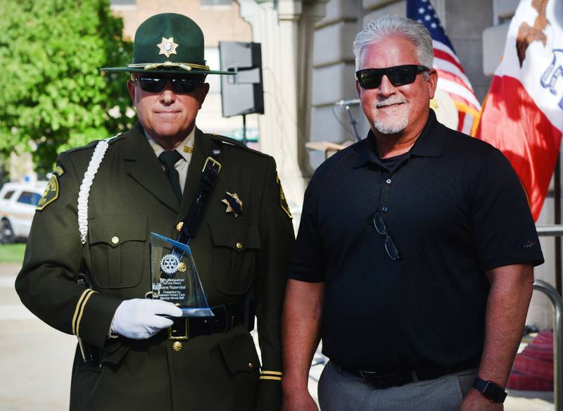 Jasper County Chief Deputy Duane Rozendaal receives the Jasper County Law Enforcement Distinguished Service Award by the Rotary Club of Newton.