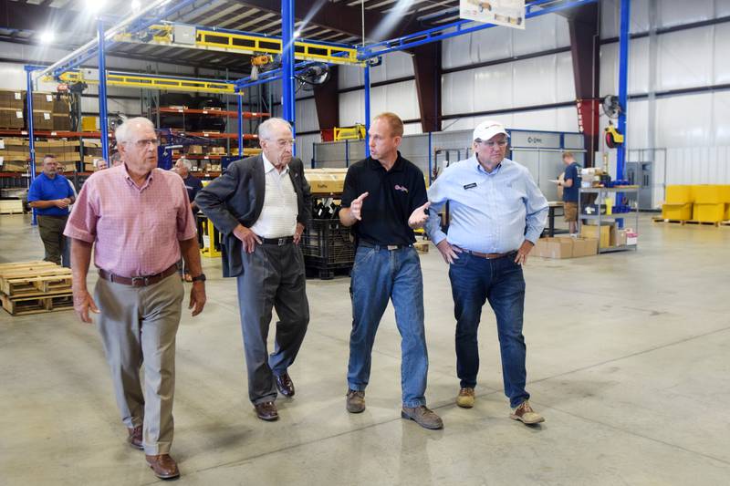 State Sen. Ken Rozenboom, U.S. Sen. Chuck Grassley and House Rep. Jon Dunwell on Aug. 15 receive a tour of the new Co-Line Manufacturing facility constructed in Jasper County. Grassley held a Q&A with workers at Co-Line as part of his 99-county tour. At the time, Grassley's visit to Jasper County was the 89th county he had visited this year.