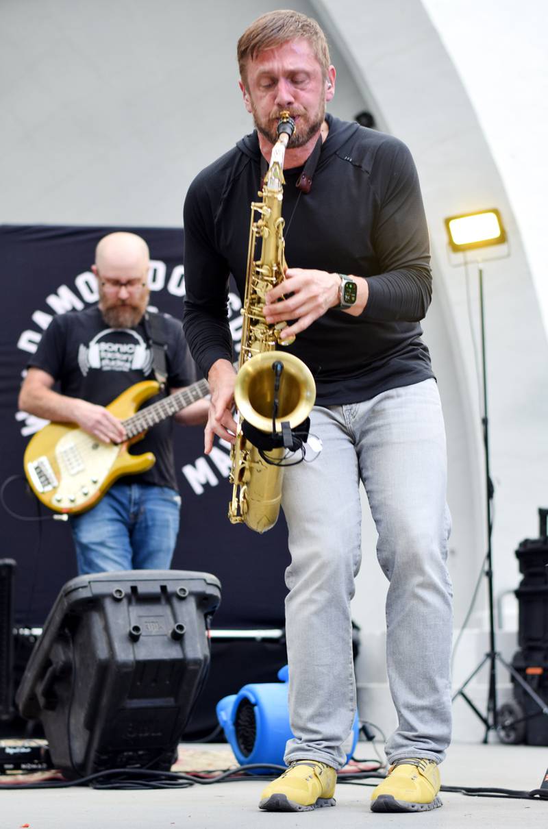 Damon Dotson, a Des Moines-based musician, performs the Maytag Bowl during the last night of Newton Fest on Saturday, June 10 at Maytag Park.