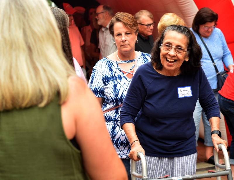 Newton High School graduates gather for drinks and camaraderie at the all-class reunion June 7 at Legacy Plaza. Newton Alumni Weekend brought back Cardinals for a weekend of partying and fellowship.