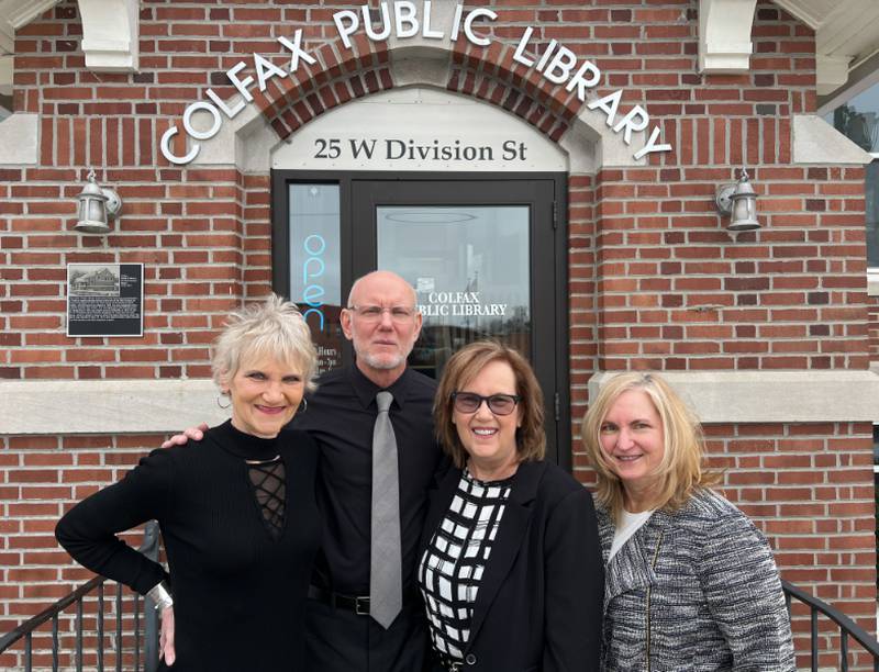 Karen Douglas, Matt Millburn, Kathy Kaldenberg and Patty Shissler, recently presented a memorial donation to the Colfax Public Library in honor of their father, Francis Millburn.