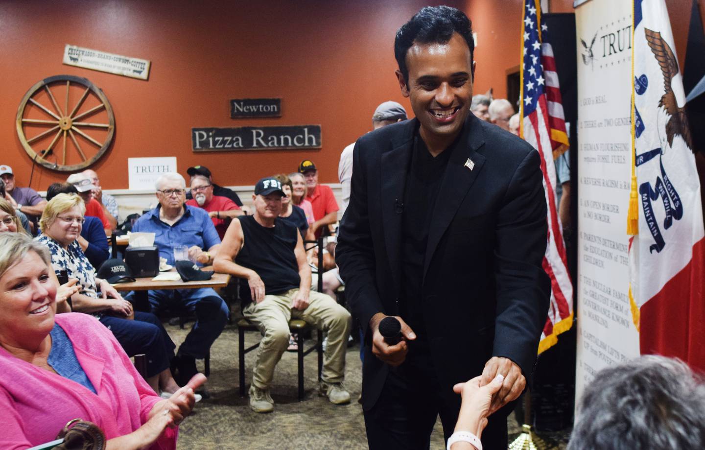 Republican presidential candidate Vivek Ramaswamy greets guests during a campaign stop Aug. 25 at the Pizza Ranch in Newton. According to the Jasper County Republican Party, more than 170 people attended the event.