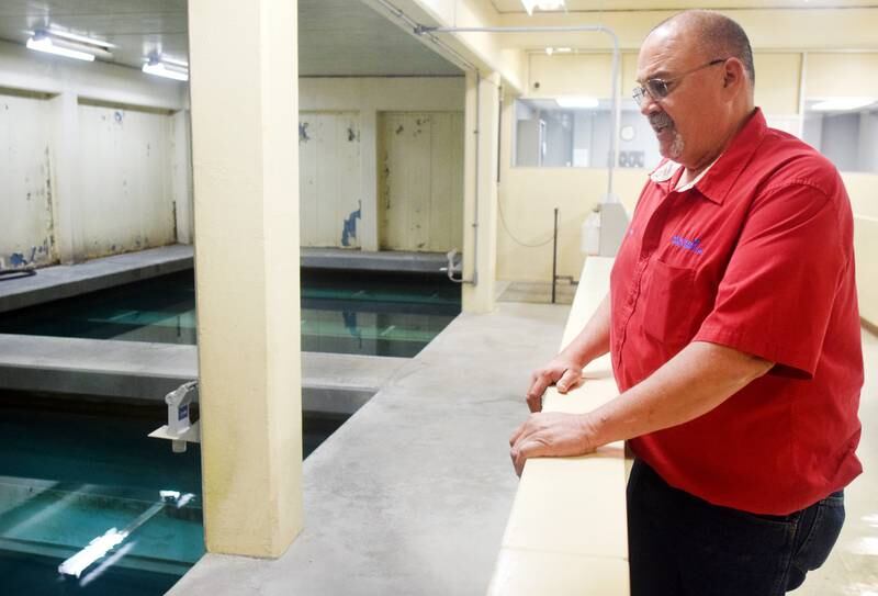 Todd Pierce, supervisor of the Newton WaterWorks Treatment Plant, inspects operations at the water treatment facility.