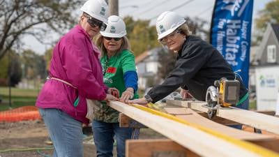 Vernon volunteers join Habitat for Humanity to build Newton home