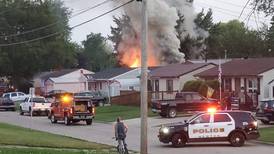 Garage fire in Newton under investigation