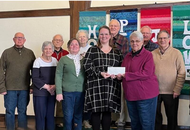 Pictured: Back row left to right CUCC members Les Morgan, David Raymond, Carolyn and Duane Hobbs and Tom Turk. Front: JaneAnn Cotton, Jenni Pryke,
Rev. Jessica Margrave Schirm, CUCC Moderator Dorothy Raymond and Pastor Krut Hoover.