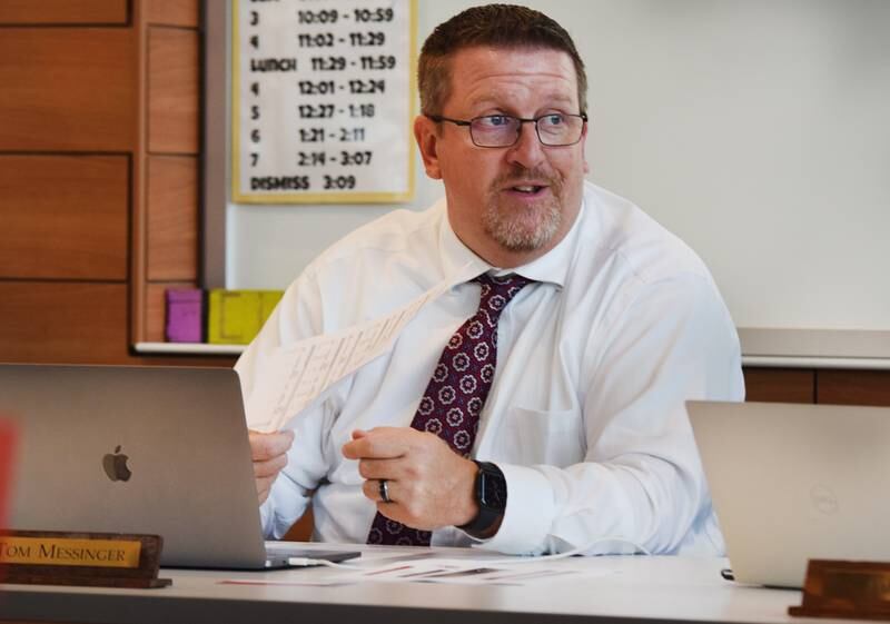 Newton Superintendent Tom Messinger shares enrollment data with school board members on Sept. 12 inside the Berg Middle School library.