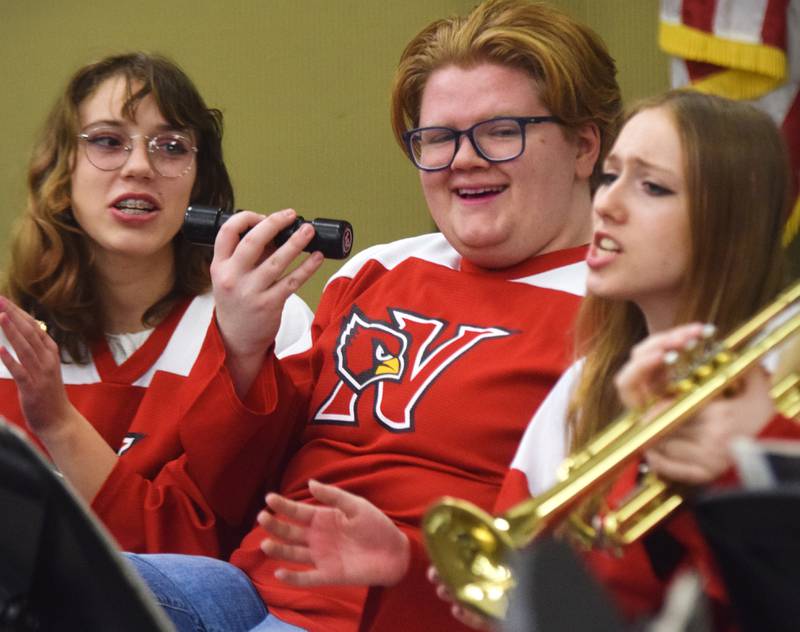 Newton alumni and students have a jam session on Dec. 16 in the band room of Newton High School. Current and past members of the Newton High School band on Dec. 16 participated in the inaugural Alumni Pep Band Night. Adam Kallal, the band director at Newton High School, organized the event in hopes it would become an annual celebration.