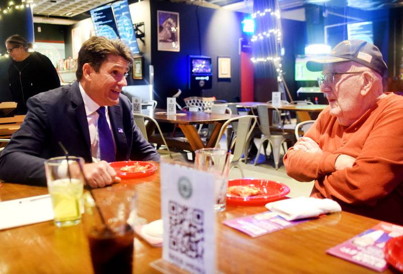 Ryan Binkley, a Republican presidential candidate, speaks to guests during a Dec. 28 campaign stop at Murph & Mary's Pub in Newton.