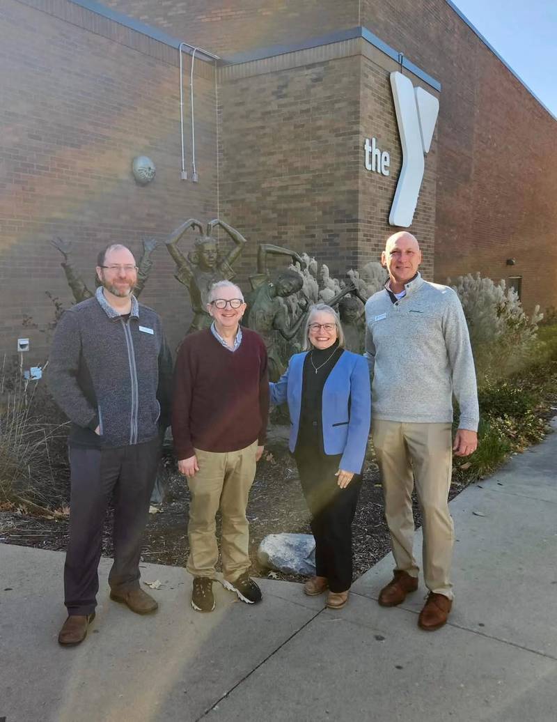U.S. Rep. Mariannette Miller-Meeks poses for a picture with Newton YMCA staff and Mark Hallam of the Newton City Council, center, during a recent visit to the facility.