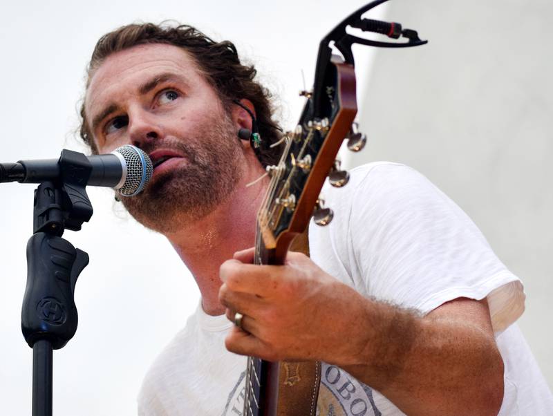 Damon Dotson, a Des Moines-based musician, performs the Maytag Bowl during the last night of Newton Fest on Saturday, June 10 at Maytag Park.