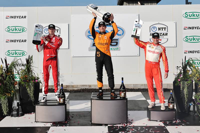 Pato O'Ward, center, celebrates his win at the IndyCar Synk 275 Powered by Sukup on July 12 at the Iowa Speedway in Newton. Photo by Chris Owens, Penske Entertainment.