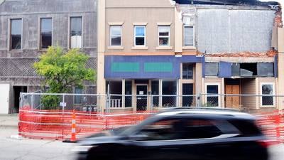 Settlement agreement requires owner to demolish damaged downtown building