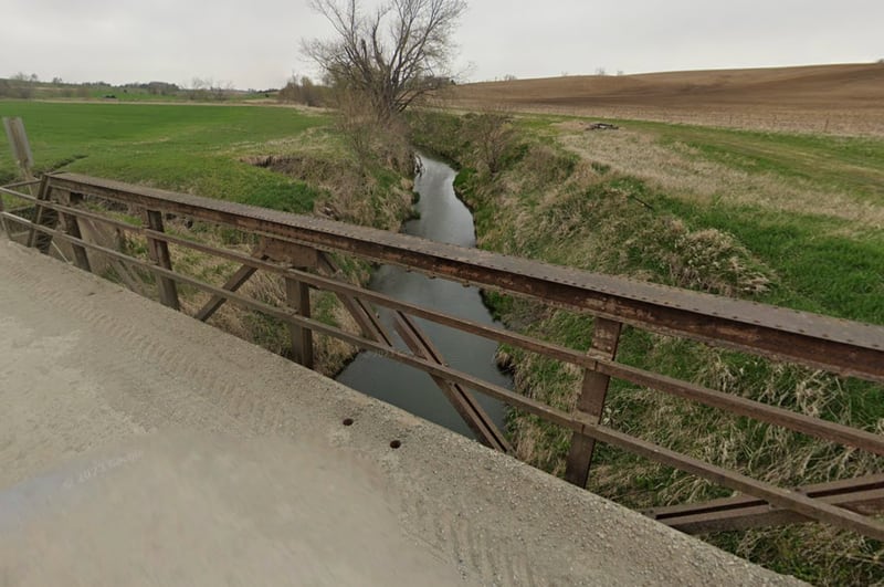 Bridge C05 was constructed in 1921 and is currently a riveted pony truss style bridge. Jasper County will be splitting the cost of this bridge located along North 115th Avenue West.