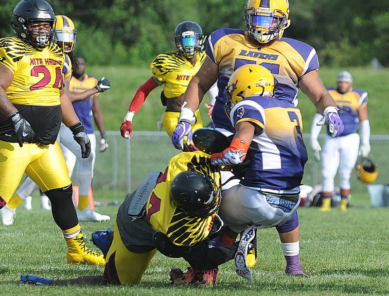 Newton Nite Hawks' Terrance Freeney (44) drops a Missouri Ravens' running back for a loss in Midwest Football League title game in Des Moines in 2019. Starting in 2022, the Nite Hawks have played home games at Newton Community School District's H.A. Lynn Stadium. The team's agreement with the school district was renewed for the 2023 season.
