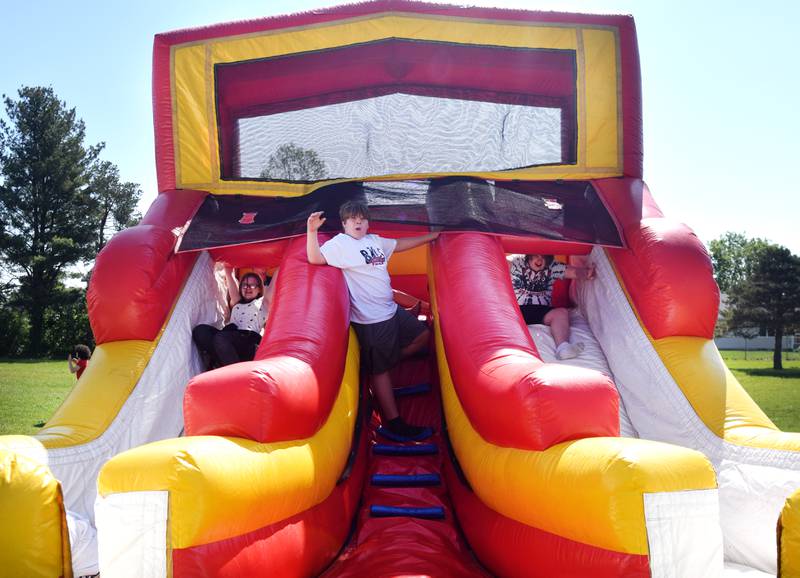 Eighth-grade students at Berg Middle School celebrate their last day as middle schoolers on May 26 by participating in carnival activities.