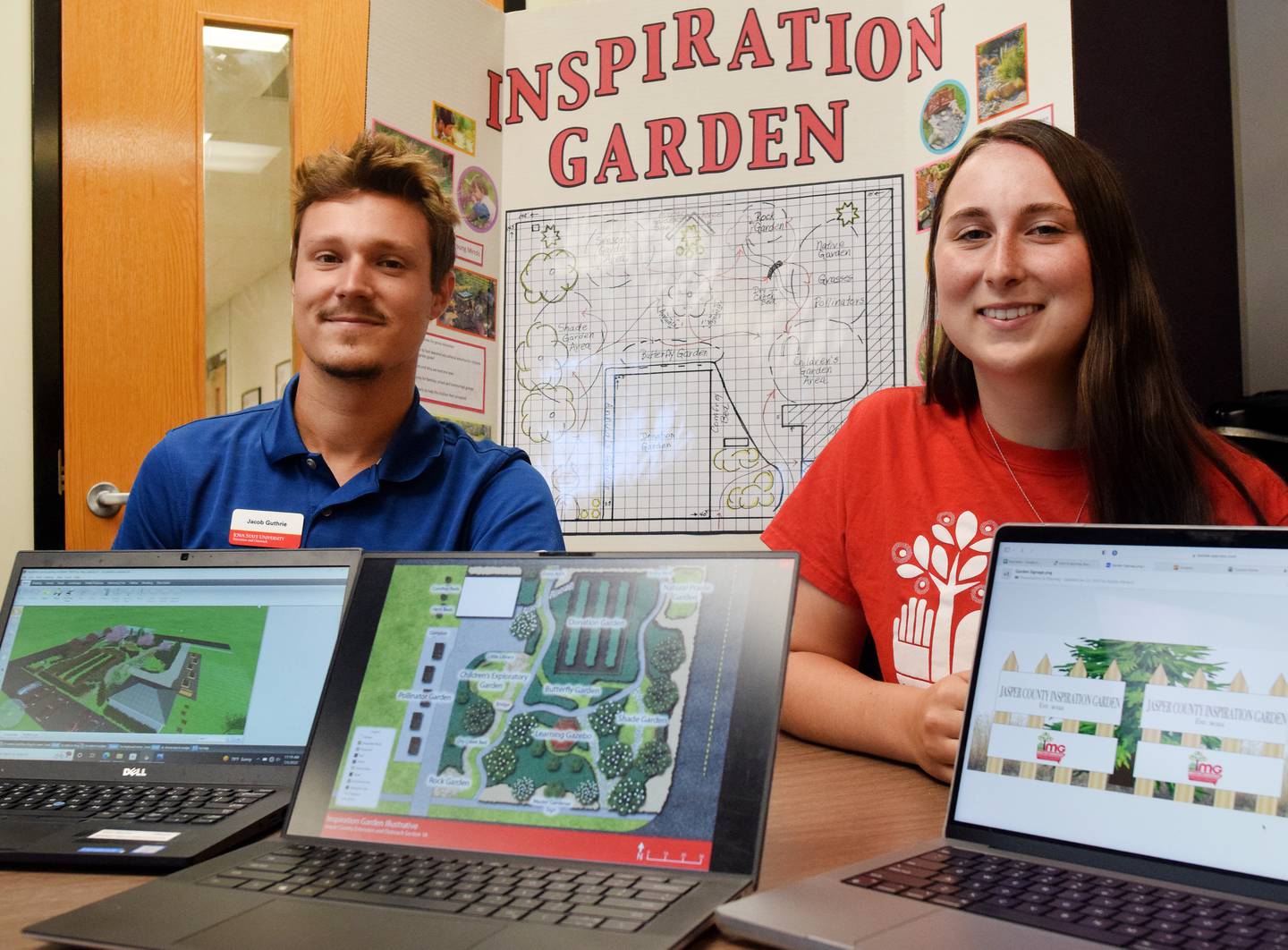 Iowa State University's Rising Star interns Jake Guthrie and Kaylee Kleitsch show off digital illustrations of how the Jasper County ISU Extension and Outreach office's community inspiration garden could look like when fully completed.