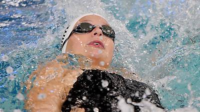 Newton swimmers cruise past Williamsburg in home opener
