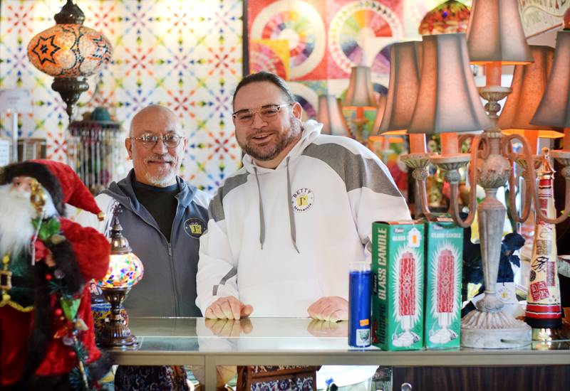 Carl Hentsch and Matt Roberts, owners of Betty J's Mercantile, offer fair-trade gfits at their Newton shop, as well as items by local artists and crafters. The new business is operating out of the former Lemon Tree Tea House and bears a similar look to the house in Tama where Roberts and Hentsch started their business.