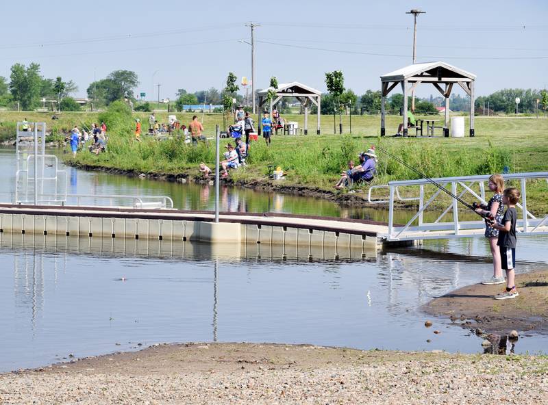 Young anglers catch bluegills and bass (and sometimes softshell turtles) during the Youth Fishing Derby on June 3 at Quarry Springs in Colfax.